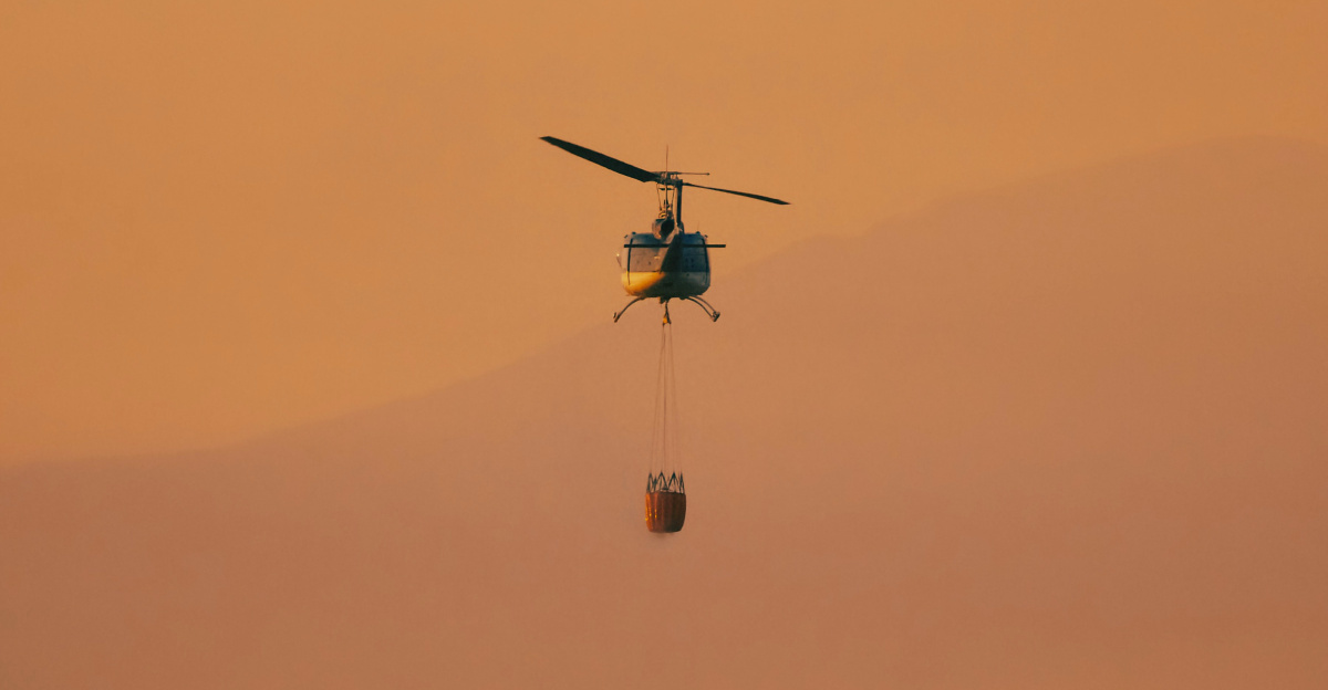 A helicopter that is flying in the sky