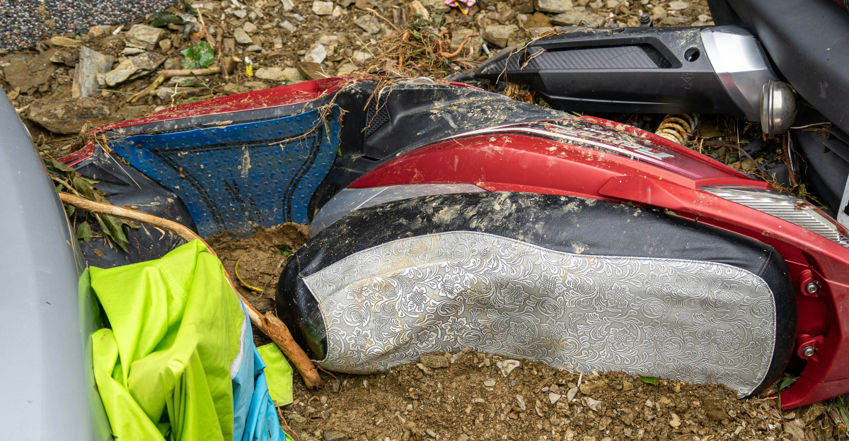 A car that is sitting in the dirt