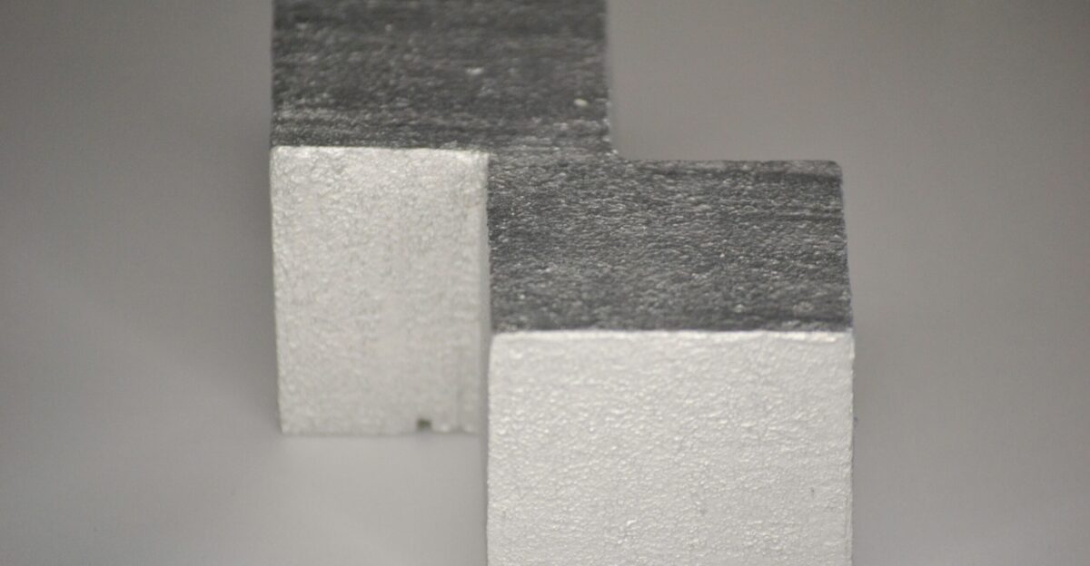 Three blocks of concrete sitting side by side