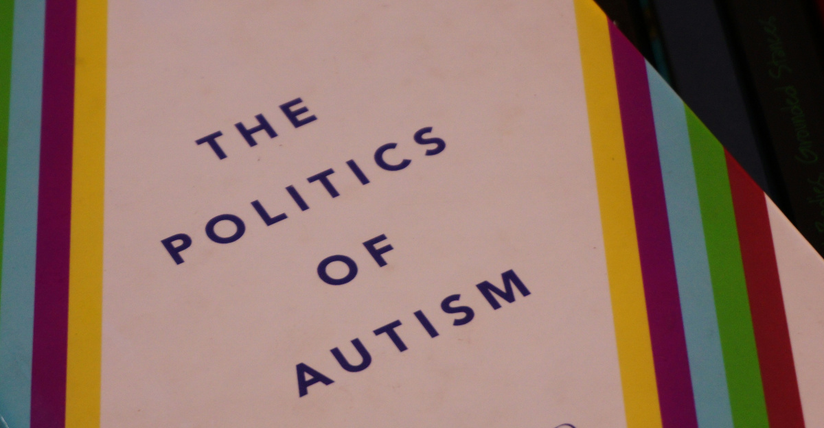 A book sitting on top of a pile of books