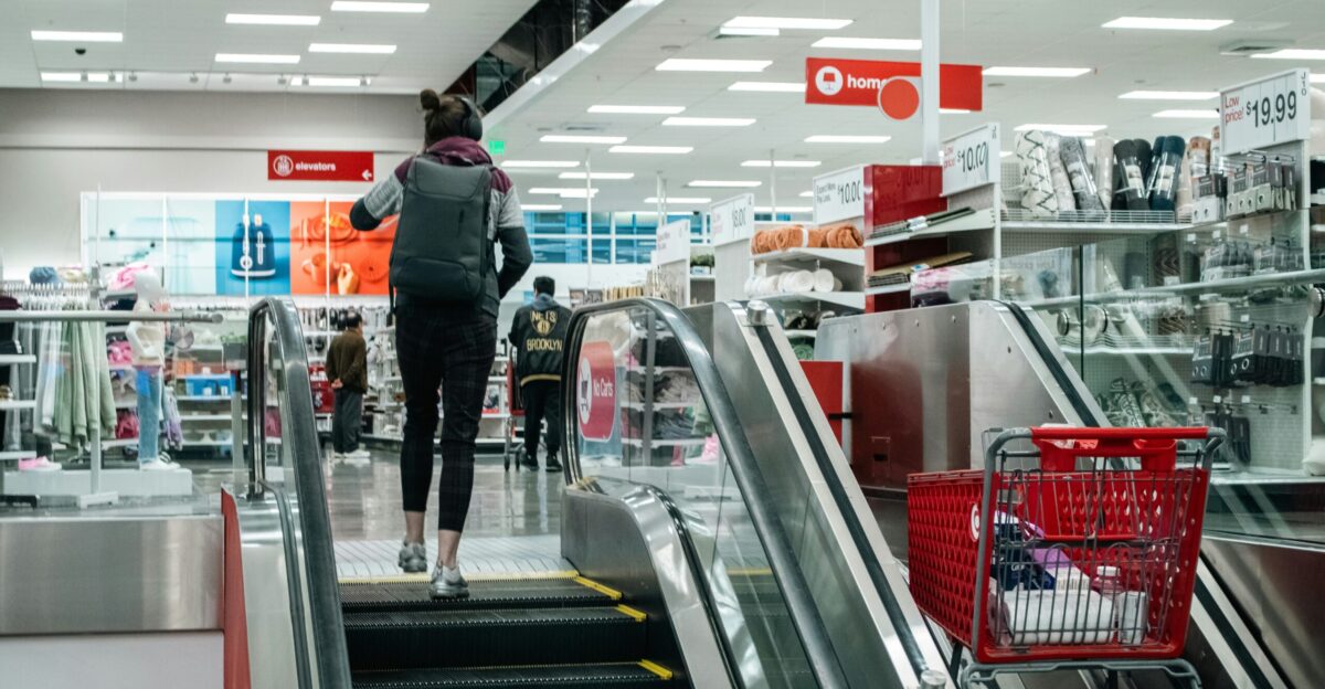 Person walks up the escalator in a target store