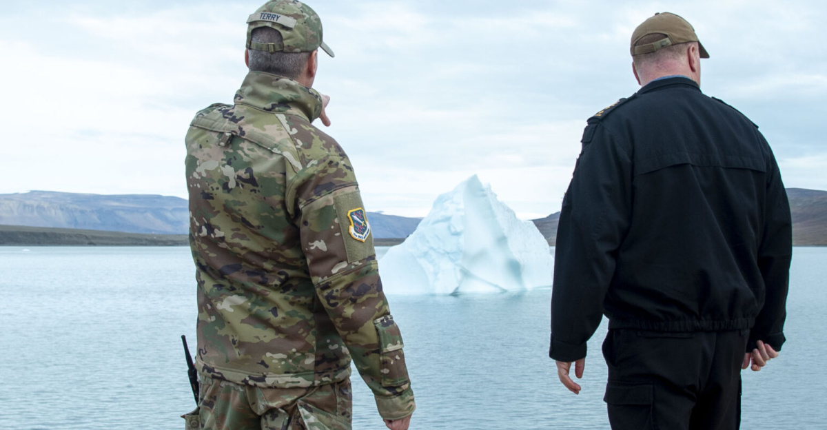 PITUFFIK, Greenland - Canadian Rear Adm. David Patchell, right, vice commander, U.S. 2nd Fleet, speaks with U.S. Space Force Col. Jason Terry, commander of 821st Space Base Group and Pituffik Space Base, about arctic strategy, at Pituffik Space Base during Operation Nanook (OP NANOOK), Aug. 29, 2023. OP NANOOK is an annual sovereignty operation and maneuver warfare exercise conducted by the Canadian Armed Forces in the Arctic, with participation by U.S. Navy and U.S. Coast Guard. (U.S. Navy photo by Lt. Alex Fairbanks)