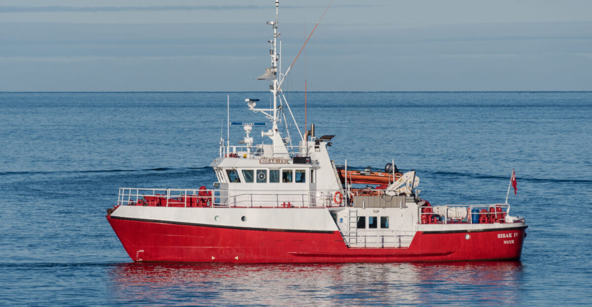 Danish Police patrol and rescue vessel SISAK IV - IMO 9206346 in Sisimiut Harbor Greenland on September 4 2017