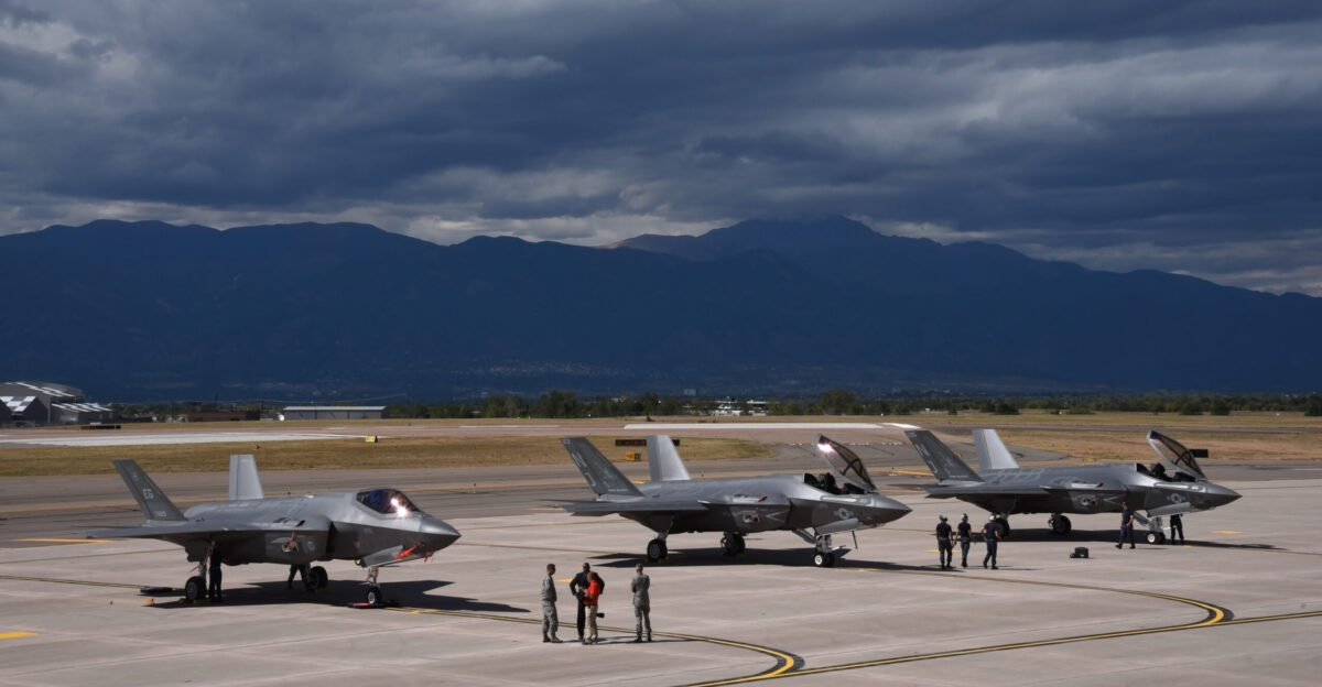 PETERSON AIR FORCE BASE Colo - An Air Force F-35A Lightning II assigned to the 58th Fighter Squadron at Eglin Air Force Base Fla and two Navy F-35C Lightning II assigned to the Strike Fighter Squadron 101 also at Eglin AFB sit on the flightline at Peterson AFB Colo Sept 30 2016 The F-35 combines 5th generation fighter aircraft characteristics including advanced stealth integrated avionics sensor fusion and superior logistics support with the most powerful and comprehensive integrated sensor package of any fighter aircraft in history U S Air Force photo by Airman 1st Class Dennis Hoffman Unit 21st Space Wing Public Affairs