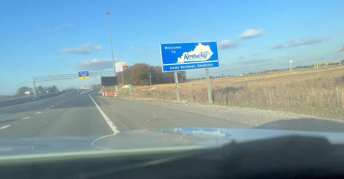 A welcome to Kentucky sign on I-65 North