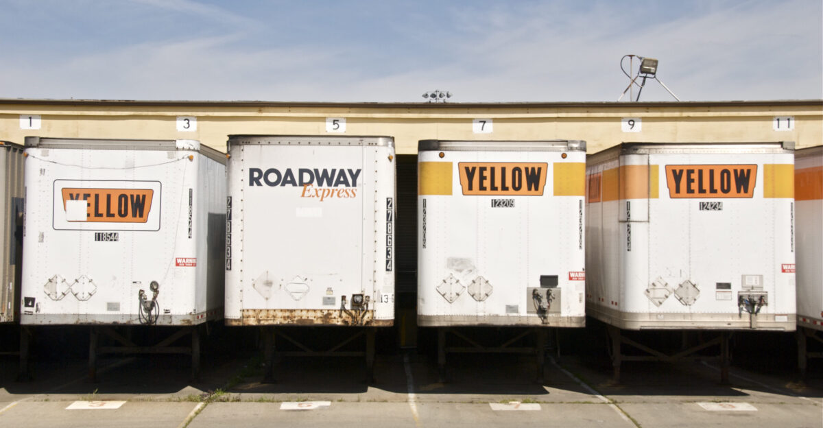 Vintage Yellow Transportation and Roadway Express logos Company name now YRC Worldwide in Overland Park Kansas by Cam Vilay