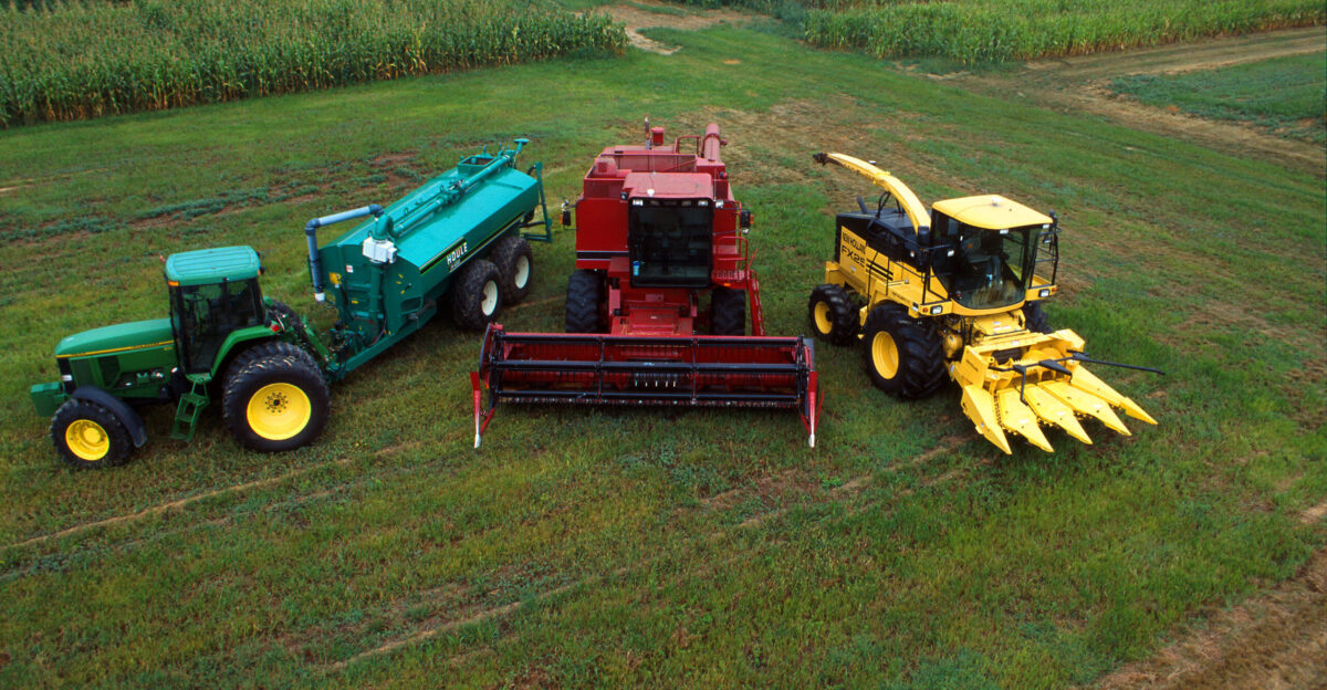 Many farm machines at ARS Beltsville Agricultural Research Center are running on a mixture of diesel fuel and biodiesel which is made from soybean oil - from left to right John Deere 7800 tractor with Houle slurry trailer Case IH combine harvester New Holland FX 25 forage harvester with corn head