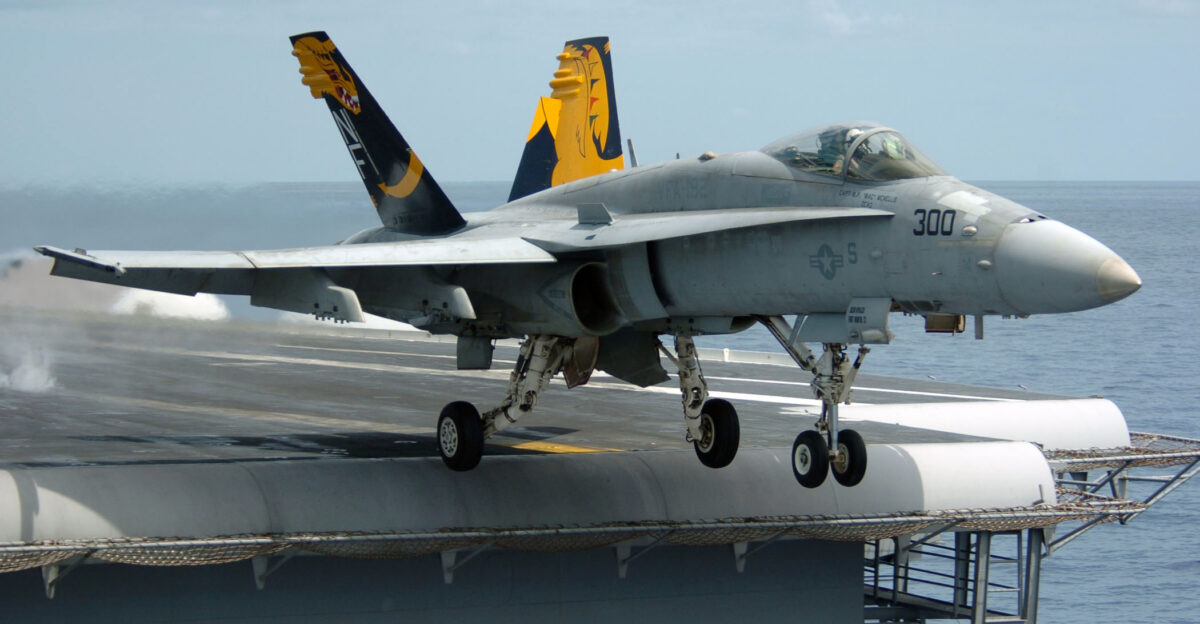 Pacific Ocean Aug 17 2005 - An F A-18C Hornet assigned to the Golden Dragons of Strike Fighter Squadron One Nine Two VFA-192 launches from the flight deck of the conventionally powered aircraft carrier USS Kitty Hawk CV 63 Kitty Hawk and embarked Carrier Air Wing Five CVW-5 are currently returning to their homeport after a scheduled deployment in the 7th Fleet area of responsibility