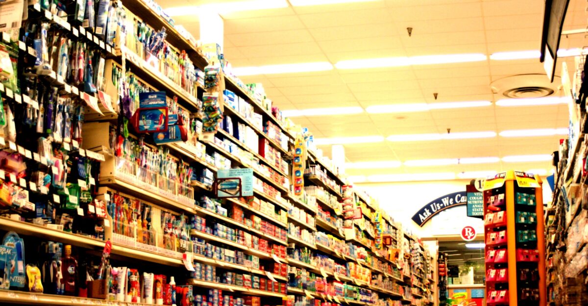 Aisle in Winn-Dixie in Pensacola Florida 2007 - sign says Ask Us We Care