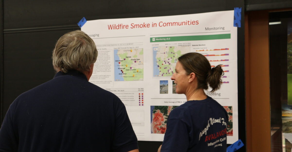 On September 3 2017 fire staff held a community meeting to provide an overview of the Chetco Bar wildfire The meeting was held at the Illinois Valley High School in Cave Junction It was attended by more than 550 people The Chetco Bar Fire was reported on July 12 2017 The initial size-up of the fire was 1 4 acre burning in the 2002 Biscuit Fire and 1987 Silver Fire scars located in the Kalmiopsis Wilderness roughly six air miles west of Pearsoll Peak and north of the Chetco River The fire is approximately 5 miles northeast of Brookings Oregon The area is comprised of mixed conifer and deciduous forest brush and snags from the 2002 Biscuit Fire and 1987 Silver Fire The fire is burning in areas of fire scar and islands that were previously unburned The combination of down dead fuels with a newly cured grass makes the terrain quite hazardous for firefighters Photo by Maria Thi Mai BLM