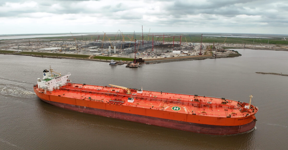 The crude Oil Tanker Eagle Kinabalu in Port Arthur Texas passing by a new LNG facility
