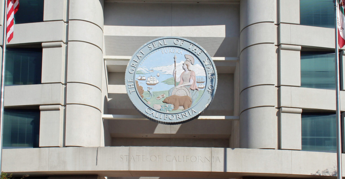 The Governor Edmund G. "Pat" Brown Building in San Francisco, California. At the time this photo was taken, this building was home to the headquarters of the California Public Utilities Commission. To be clear, the photo is not distorted; the building facade is curved. Photographed by user Coolcaesar on August 6, 2023.