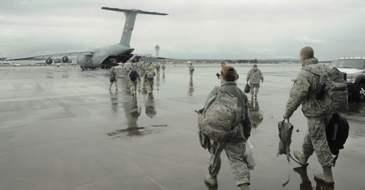 Soldiers and Airmen from the Oregon National Guard s Chemical Biological Radiological Nuclear and high-yield Explosives CBRNE Enhanced Response Force Package CERFP walk toward a waiting C-5 Galaxy March 26 2014 as they depart the Portland Air National Guard Base Ore in support of Vigilant Guard-Alaska 2014 More than 200 Guardsmen from Oregon traveled to Joint-Base Elmendorf-Richardson for 10-days of training along with Hawaii National Guard CERFP members to take part in a disaster scenario modeled after the March 27 1964 earthquake in Alaska U S Air National Guard photo by Tech Sgt John Hughel 142nd Fighter Wing Public Affairs Released