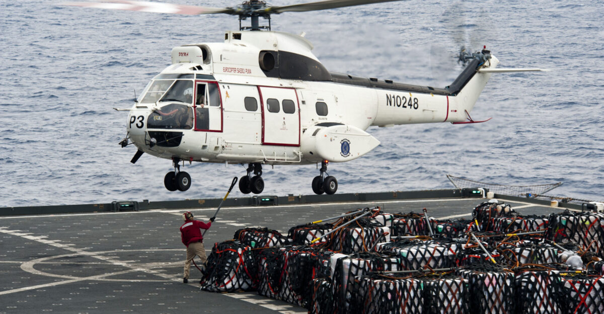 PACIFIC OCEAN Oct 5 2012 An SA-330J Puma helicopter picks up supplies from the flight deck of the Military Sealift Command dry cargo and ammunition ship USNS Richard E Byrd T-AKE 4 during a replenishment at sea with the Nimitz-class aircraft carrier USS John C Stennis CVN 74 John C Stennis is returning to the U S 7th and 5th Fleet areas of responsibility four months ahead of schedule in order to maintain combatant commander requirements and Navy assets in the region The U S Navy is constantly deployed to preserve peace protect commerce and deter aggression through forward presence Join the conversation on social media using warfighting U S Navy photo by Mass Communication Specialist 3rd Class Kenneth Abbate Released 121005-N-OY799-061 Join the conversation navylive dodlive mil