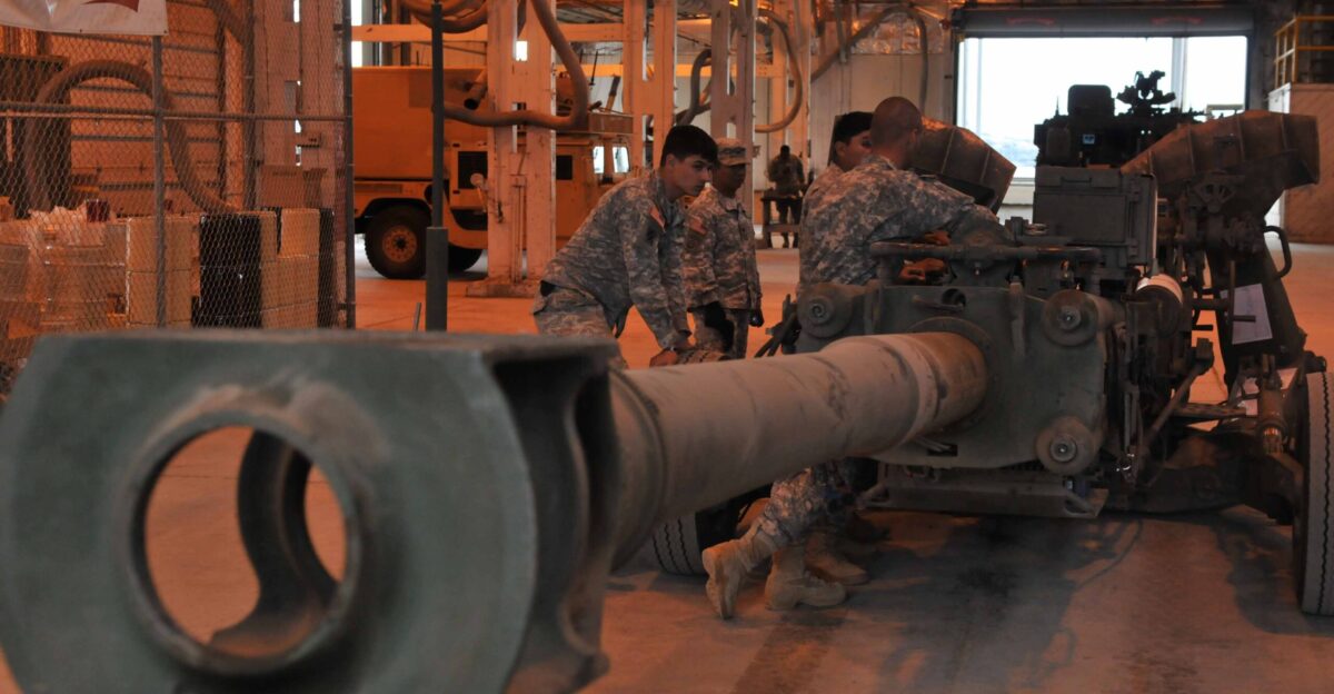 All-wheel vehicle mechanics with the Combat Repair Team attached to the 2nd Squadron 14th Cavalry Regiment 2nd Stryker Brigade Combat Team 25th Infantry Division repair an M777 howitzer on Oct 14 at Yakima Training Center Wash The CRT deployed with the cavalry squadron from Schofield Barracks Hawaii to Yakima Training Center to support training operations in Washington state
