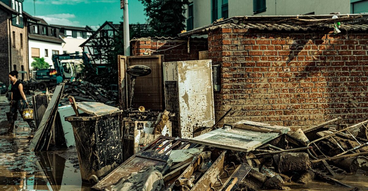 flood mud building tractor dirt road historic center old building city flood disaster flooding civil protection water flood of the century nature precipitation