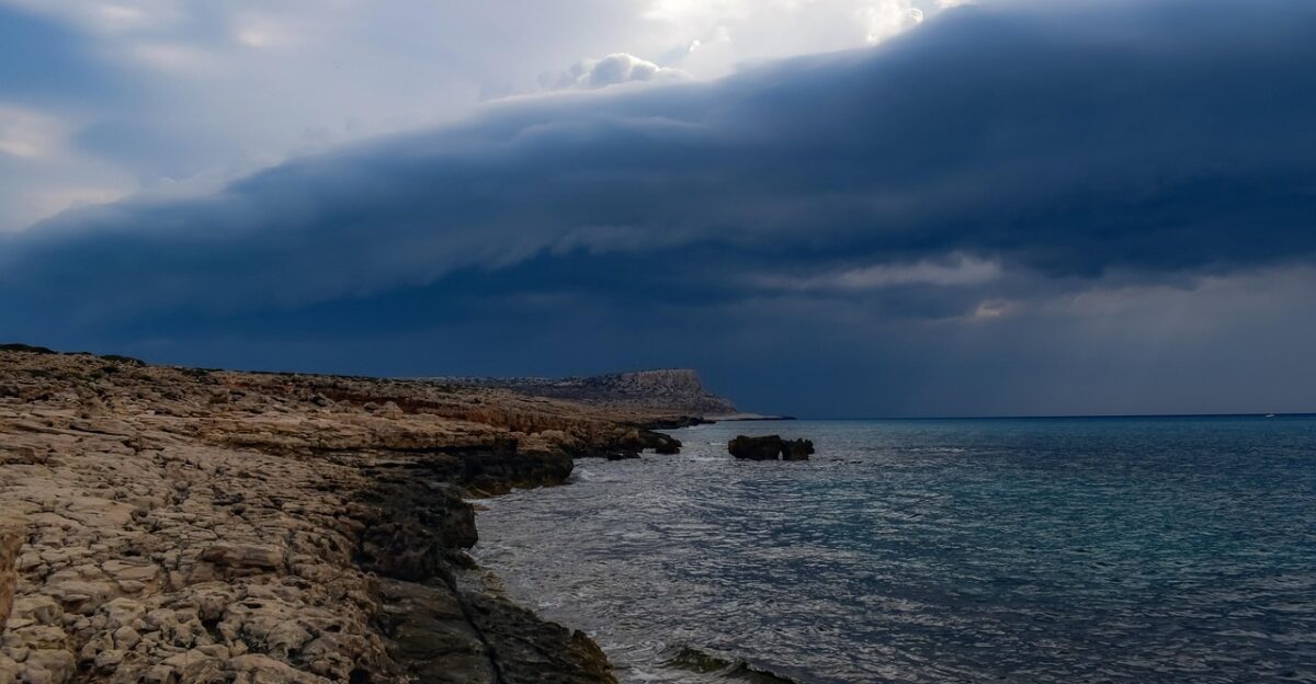 storm coast rocky rock nature landscape sea clouds coastline autumn season shore weather stormy cloudy mood blue storm
