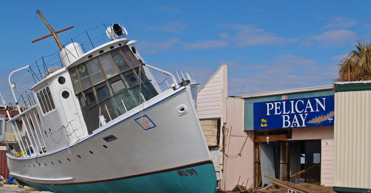 sea outdoors industry sky transportation system water travel horizontal plane seashore flood hurricane katrina hurricane katrina gabriel raggio boat ship no parking dock chalmette louisiana new orleans wind tornado devastation relief 9th ward raggio studios earthquake nature gabe raggio raggio blue plane blue industry