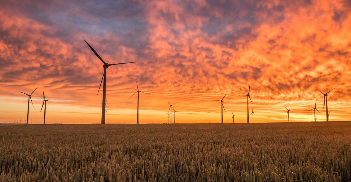 windmills fields sunset clouds sky cloudsscape dusk nature twilight wind turbines renewable energy horizon wind power wind energy alternative energy green energy field sunrise