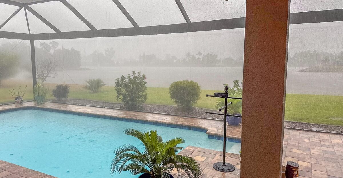 florida storm swimming pool raining rain nature sky clouds cloudy