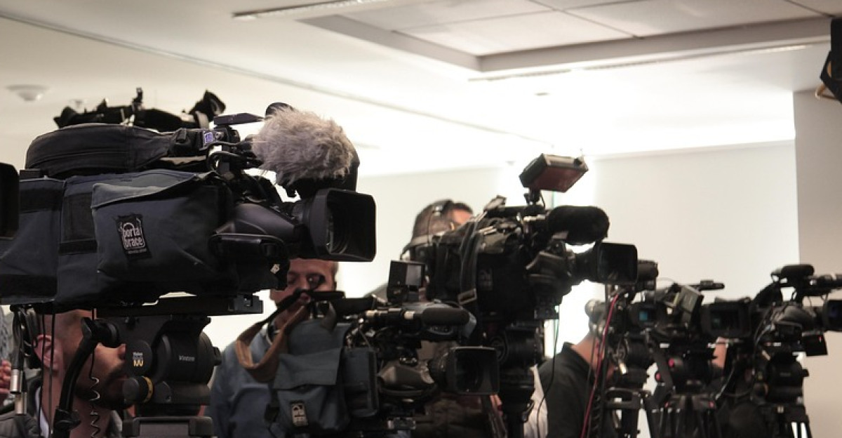 cameras filming media reporters conference video interview tripod cameramen interview interview interview interview interview