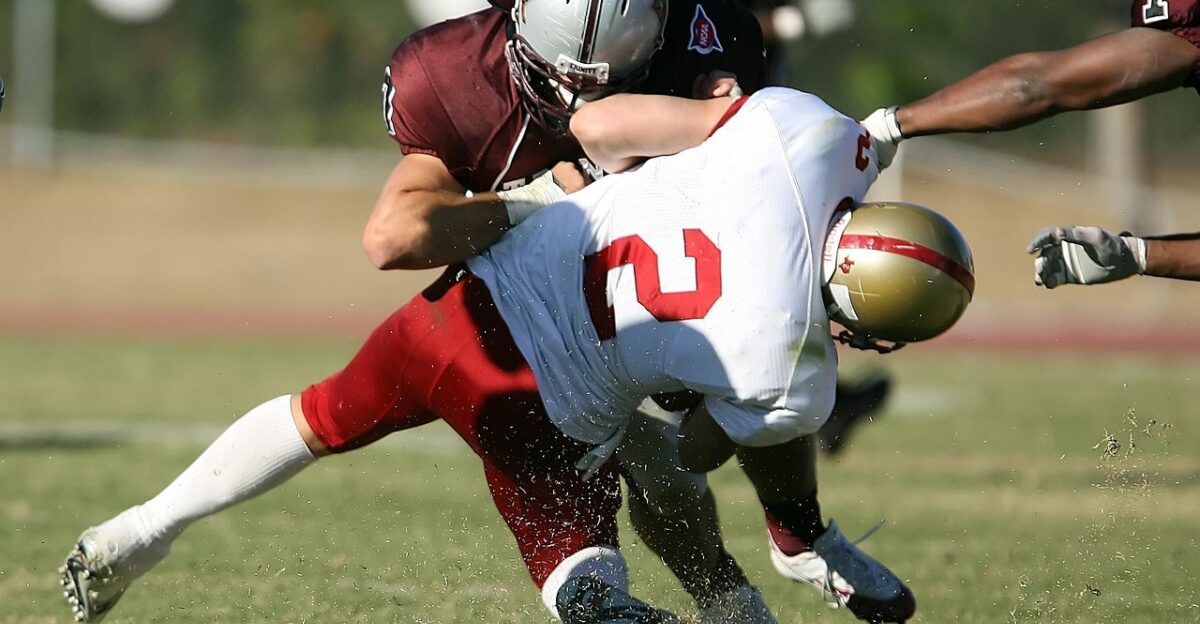 american football quarterback sack tackle defense injured competition gridiron play action football football player football helmet college football player sport quarterback texas american football american football american football american football american football tackle injured injured football college football college football college football