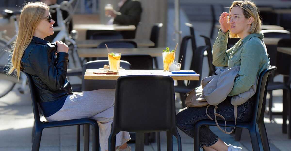 girls people terrace restaurant casual glasses drinks juice phones backgammon relaxation lifestyle urban