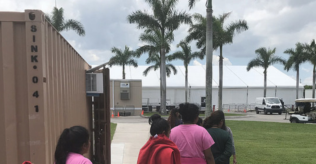 Unaccompanied minors walk in a Homestead Florida facility supervised by the Office of Refugee Resettlement on June 20 2018