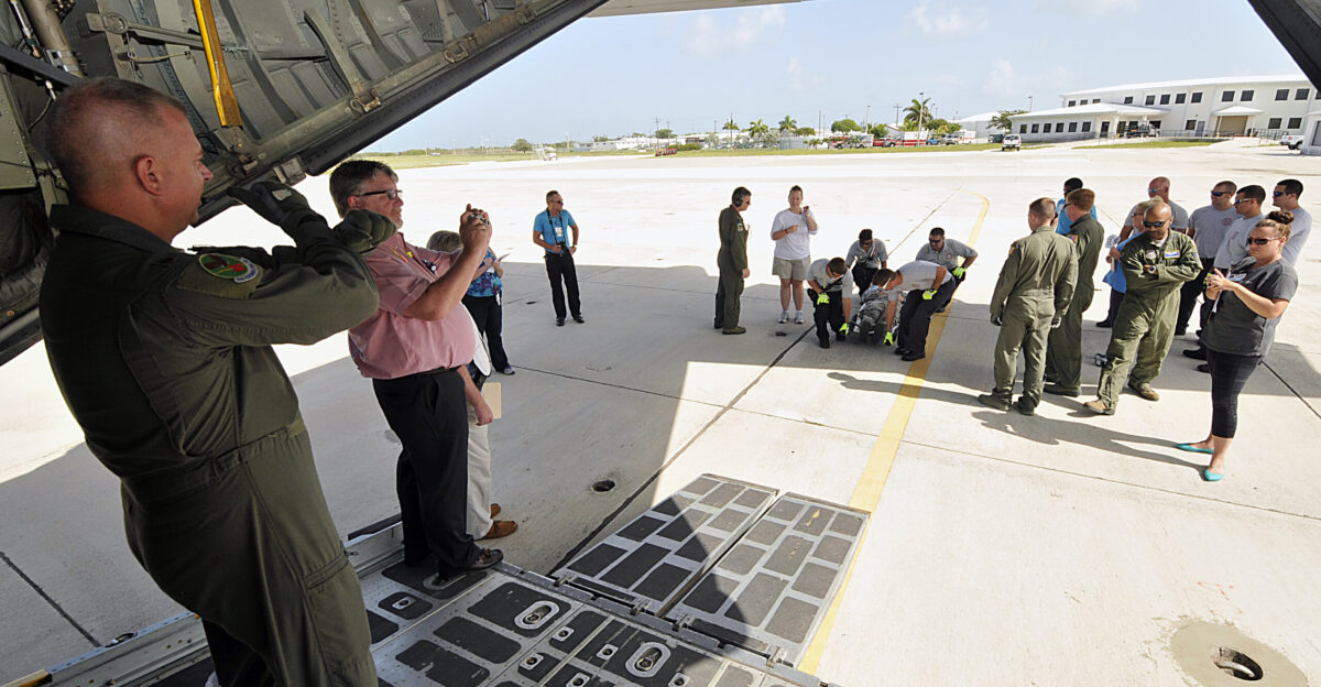 N-YB753-027 KEY WEST Fla June 26 2015 The North Carolina Air National Guard s 1156th Air Evacuation Squadron conducts litter bearing training at Naval Air Station Key West s Boca Chica Field The 156th AES trains Lower Keys Medical Center and Monroe County Fire and Emergency Services staff on special safety considerations patient preparation and basic loading principles during an annual hurricane evacuation drill U S Navy photo by Mass Communication Specialist 1st Class Brian Morales Released