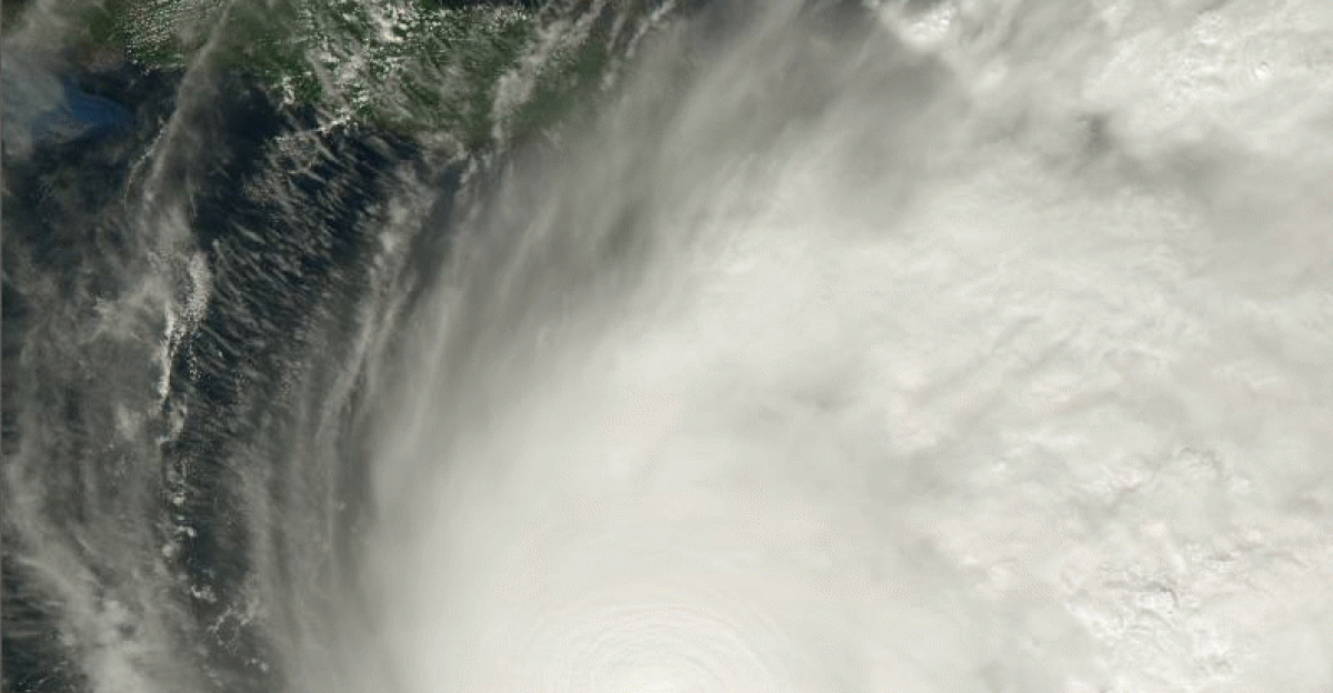 True-color satellite image of Hurricane Melissa making landfall on Jamaica