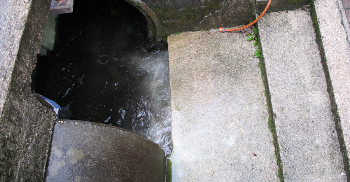 Stormwater management system Hallstatt Lake Street Obertraun Austria It consists of an open water line located beneath the street which is accessible to the public as the water source itself is located in the surrounding mountains and is about as clean as water can get It feeds directly into the Hallstatt Lake Hallstattersee