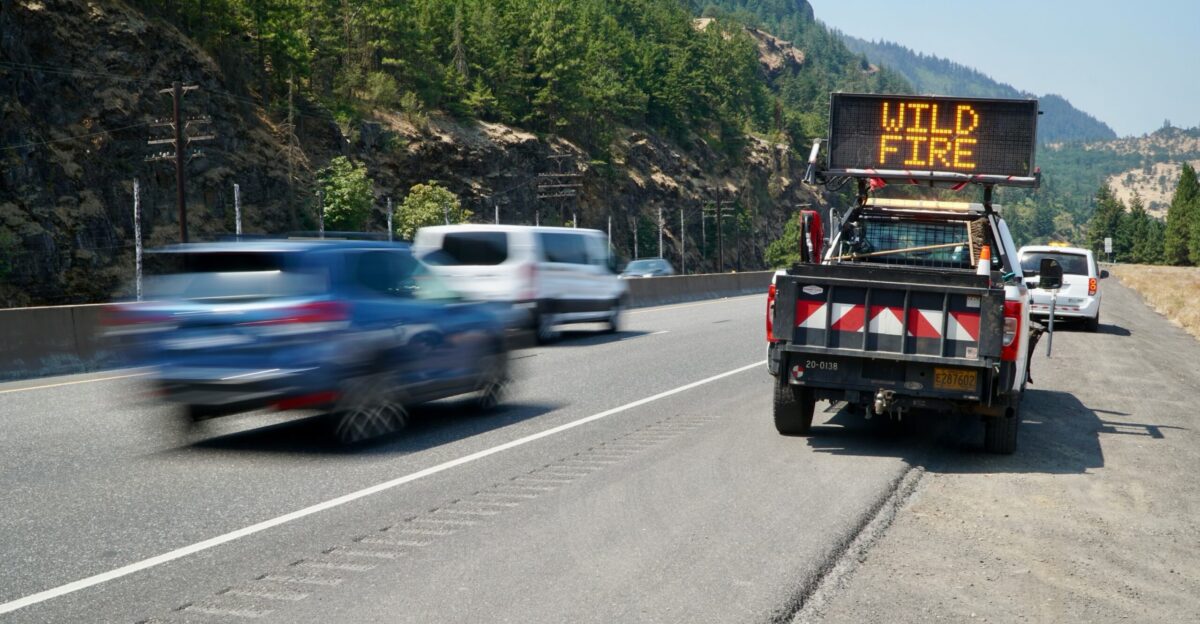 An incident response vehicle with an electronic variable sign alerts travelers along I-84 near Mosier of Microwave Fire activity Visit TripCheck com for the latest information Photo taken July 26 2024
