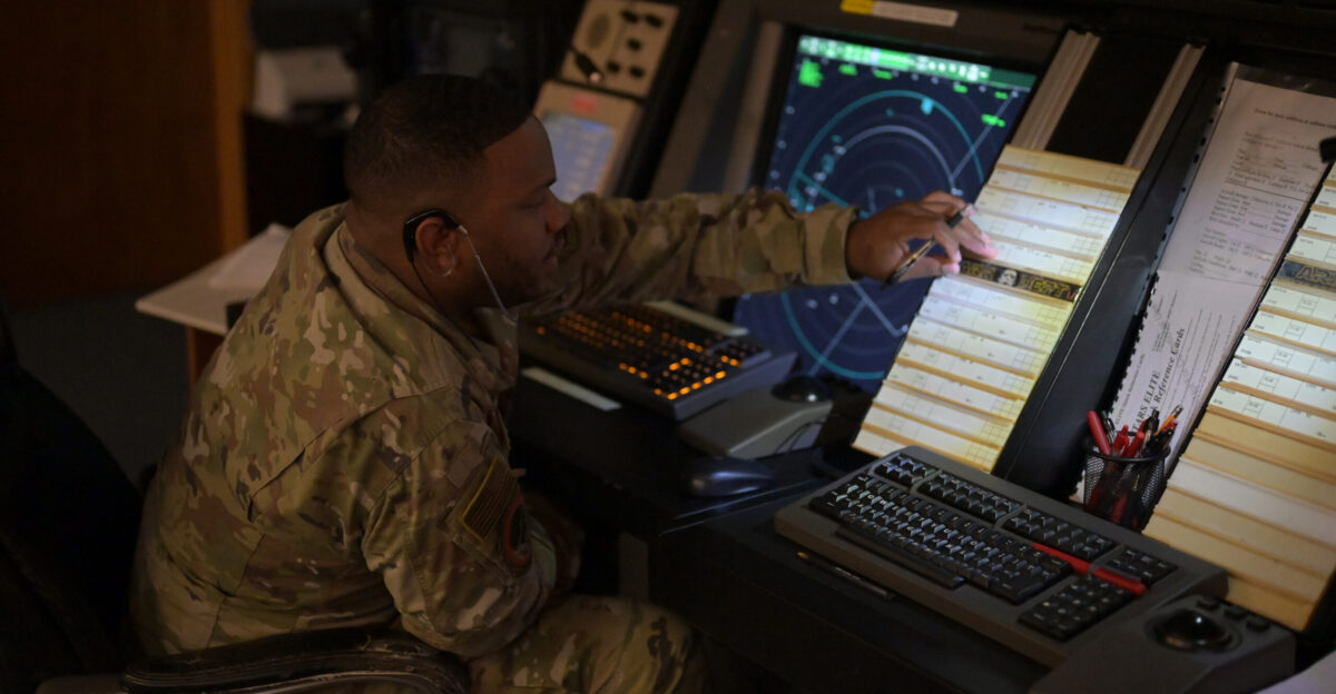 Staff Sgt Dallas Moore 65th Air Base Squadron Air Traffic Control watch supervisor verifies flight progress strips in the Radar Approach Control facility at Lajes Field Portugal April 26 2022 Air traffic controllers at RAPCON record the general information and intent of each aircraft on the strips By monitoring this information and keeping constant communication with pilots RAPCON ensures the safe arrival and departure of aircraft U S Air Force photo by Senior Airman John R Wright