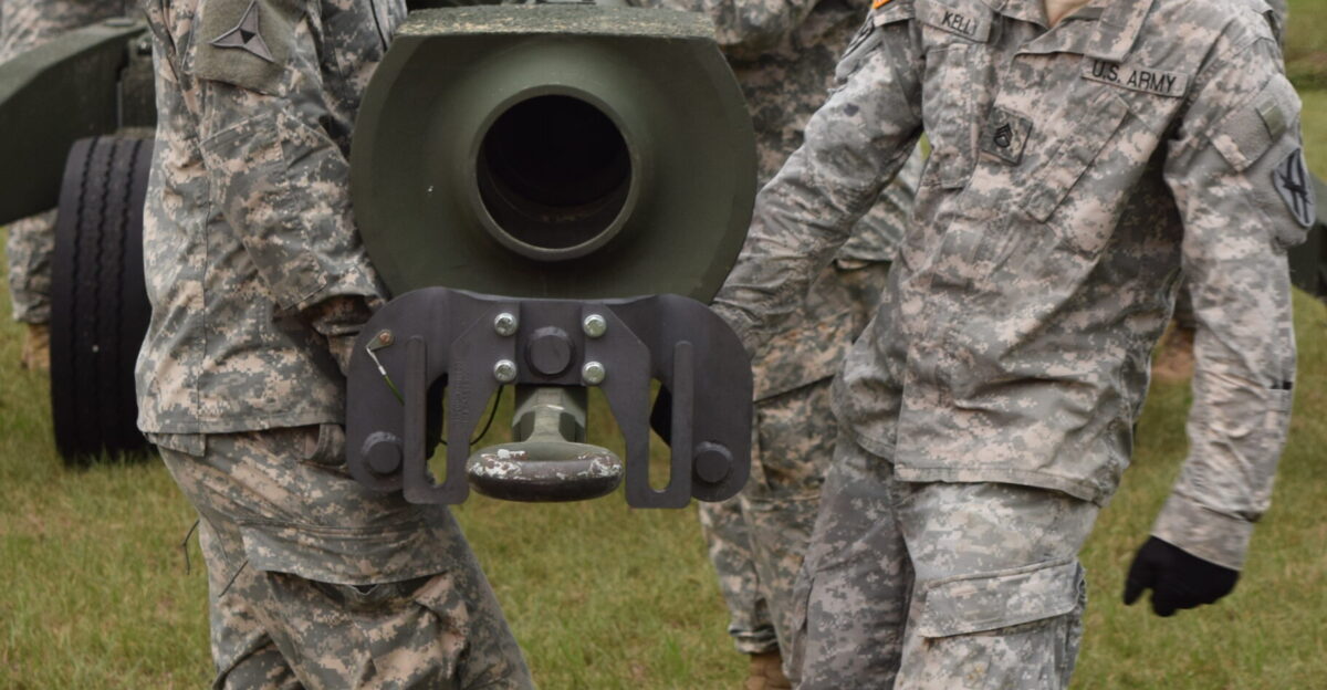 FORT STEWART Ga September 24 2015 - Sergeant William Bennet and Staff Sgt Clay Kelly of Battery C 1st Battalion 118th Field Artillery Regiment maneuver the muzzle of an M777 155 mm howitzer into position for transport The 118th FA is undergoing annual training through 30 September Georgia Army National Guard photo by Capt William Carraway released