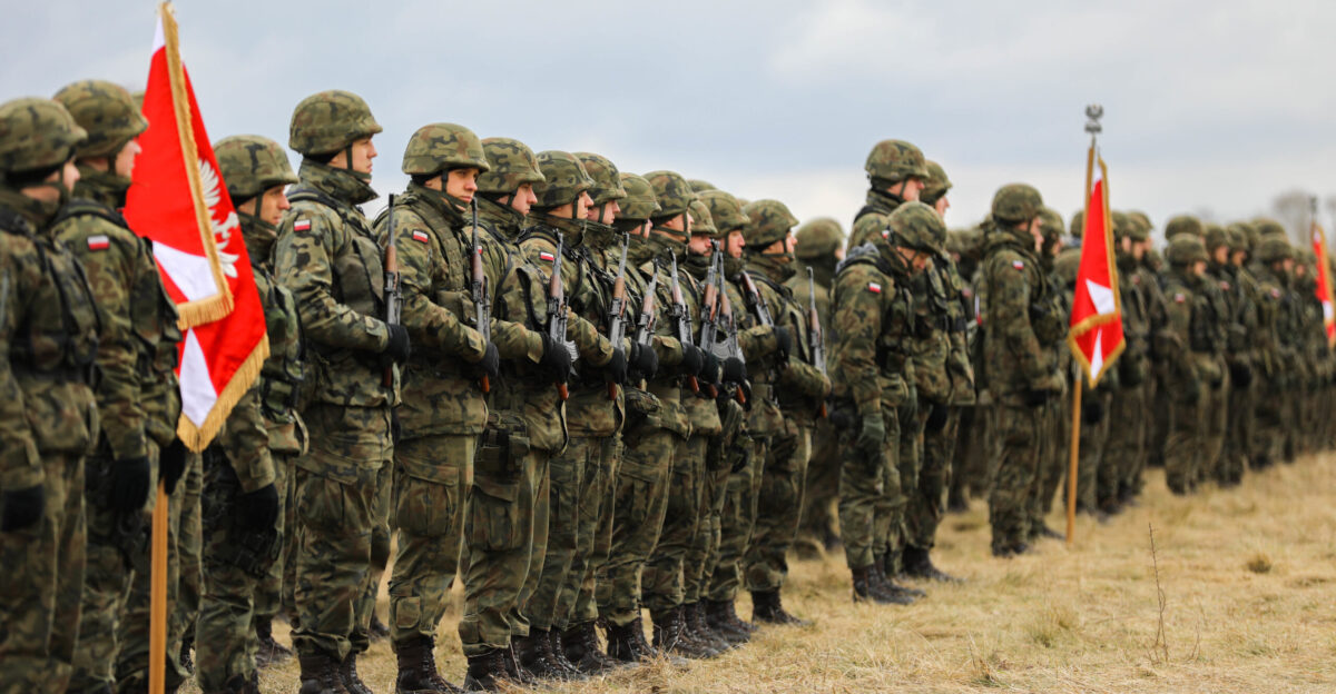 Polish Soldiers assigned to 3rd Air Defense Rocket Brigade and U S Soldiers assigned to 5th Battalion 4th Air Defense Artillery Regiment held closing ceremonies for the Poland phase of exercise Saber Strike 22 at BPTA Poland Feb 26 2022 Saber Strike series of exercises have been held on a regular basis since 2010 and demonstrate U S commitment to NATO to deterring aggression and to the sovereignty and security of U S allies U S National Guard photo by Staff Sgt Clinton Thompson
