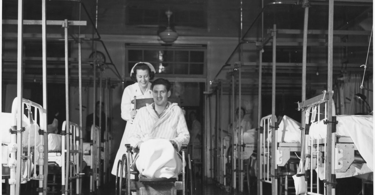 many people in hospital beds