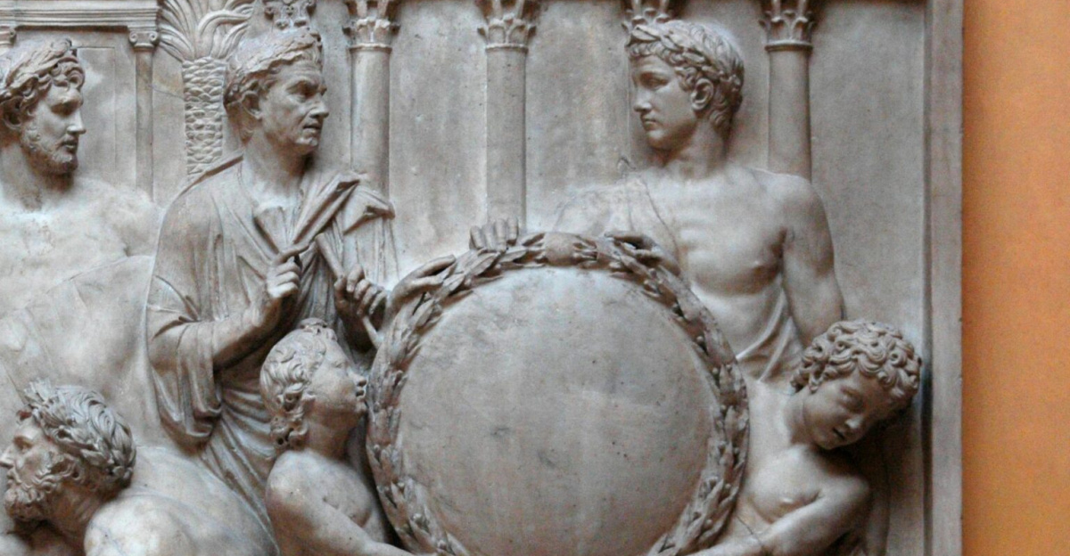 Detailed ancient Roman bas-relief sculpture in marble depicting historical figures.