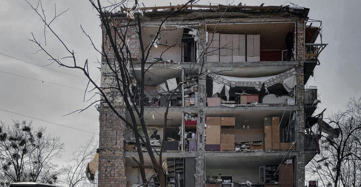 A destroyed building in Kyiv, Ukraine, showing urban devastation and reconstruction efforts.