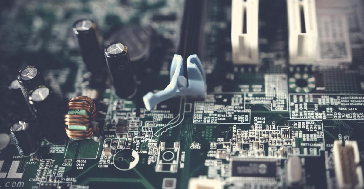 Detailed view of components on a computer motherboard showcasing technology and circuitry