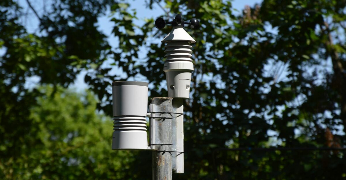 Close-up of an anemometer and weather device on a sunny day outdoors