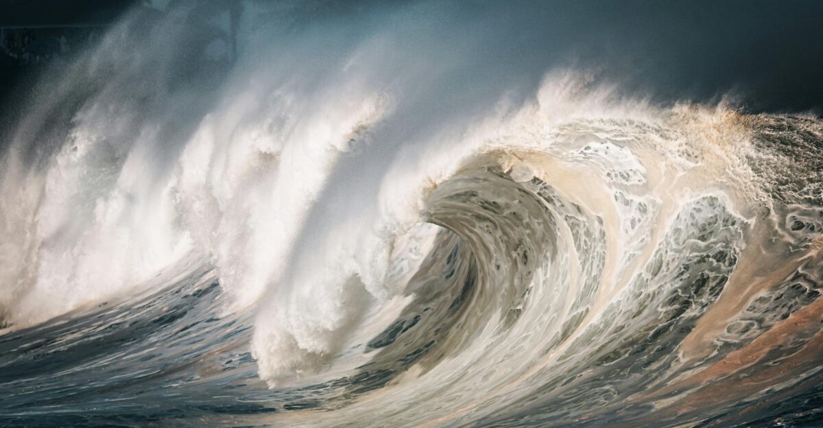 Captivating image of massive ocean waves breaking on the shore creating a dramatic scene