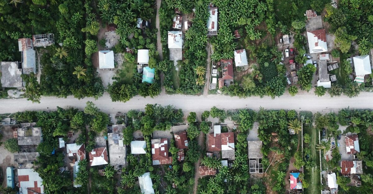 Aerial view of lush rural area in Port-au-Prince Haiti showcasing greenery and houses