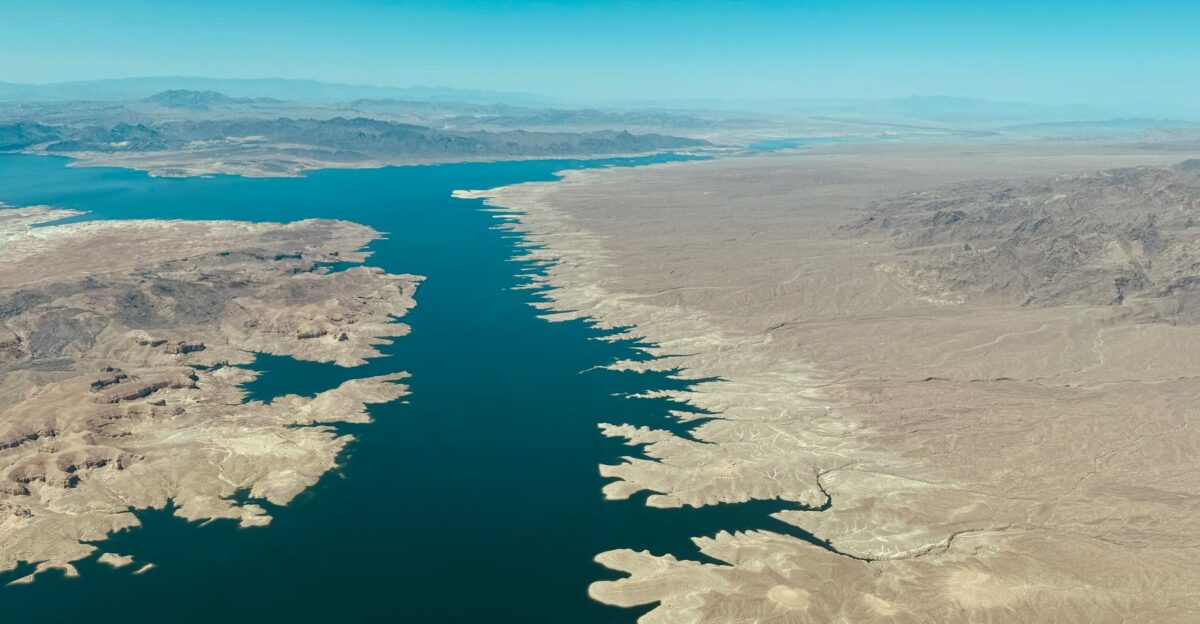 Expansive aerial view showing Lake Mead along the Colorado River with a desert landscape