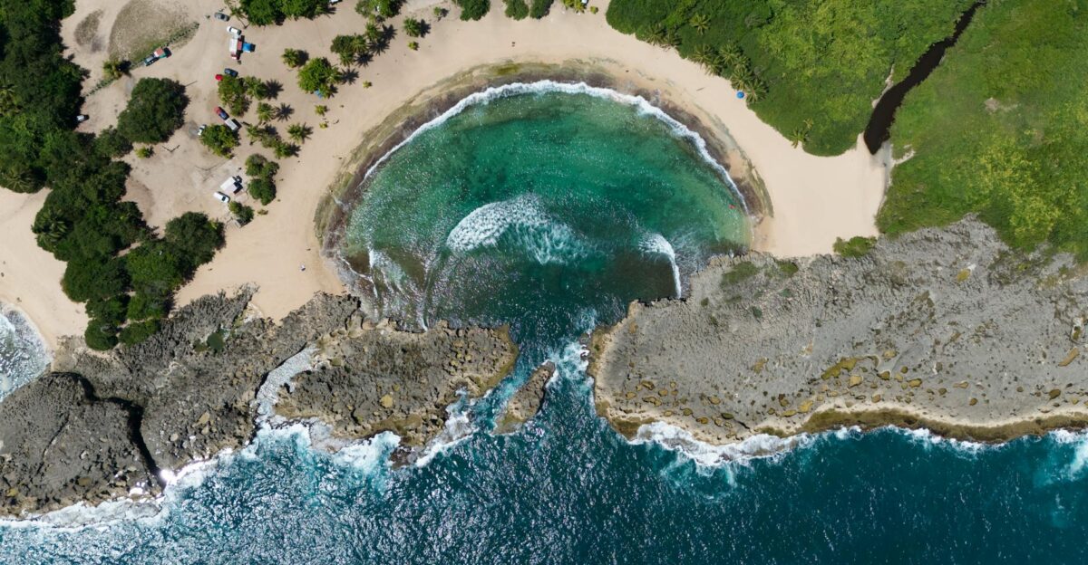 Stunning aerial view of Playa Mar Chiquita s turquoise waters and rocky coastline in Puerto Rico