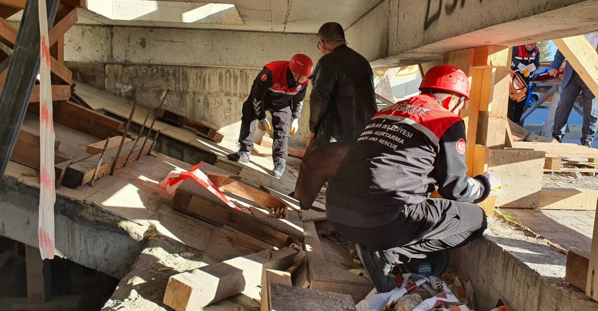 Rescue workers in Istanbul inspecting a damaged structure for safety and recovery efforts
