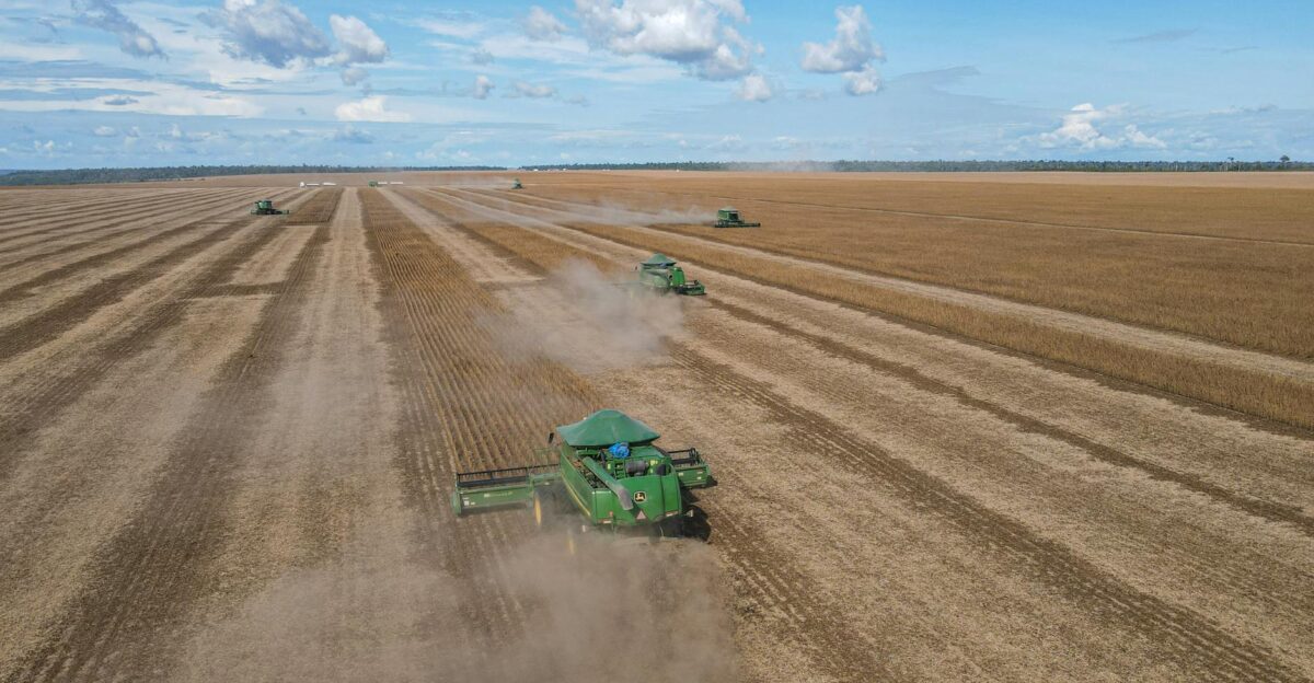 Soybean harvesters in action on a vast farm in Paragominas Brazil showcasing agricultural machinery