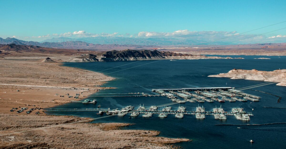 Stunning aerial view of a marina at Lake Mead featuring clear blue water and surrounding desert landscape