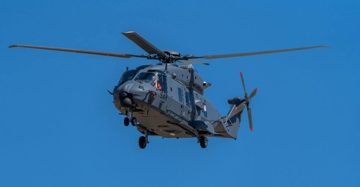 An NH90 military helicopter flying against a bright clear blue sky in Los Llanos Espa a
