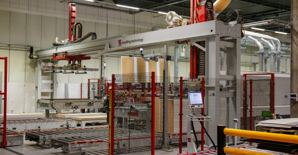 Industrial machinery with robotic arm in a modern manufacturing facility