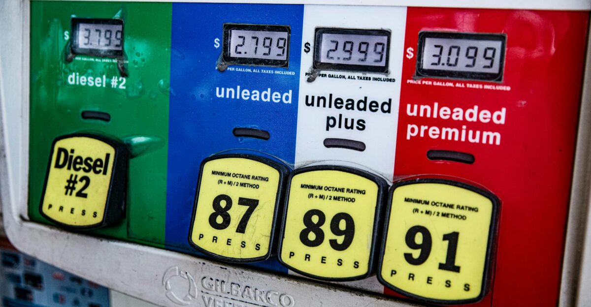 Close-up of a vintage gas pump station showing fuel prices and octane ratings in Los Angeles